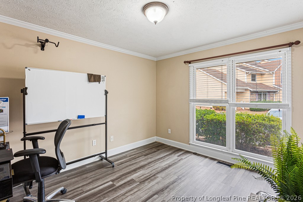 461 Lands End Road Fayetteville, NC 28314 - Photo 26 of 31 a view of a room with gym equipment and a large window