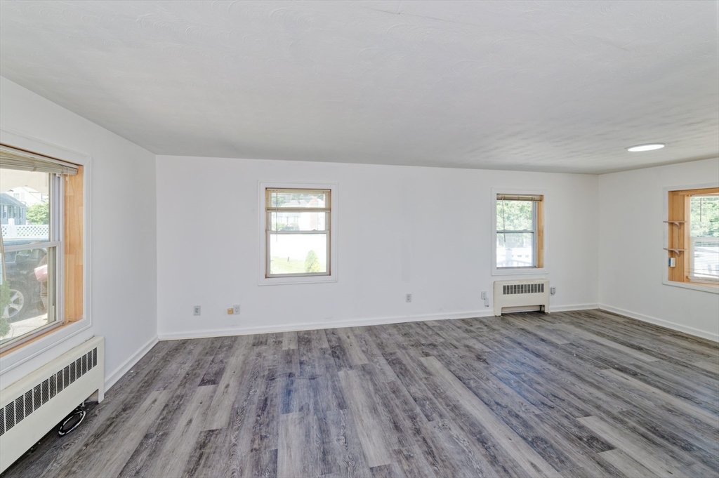 1 Rockland Rd Court Auburn, MA 01501 - Photo 21 of 38 an empty room with wooden floor and windows