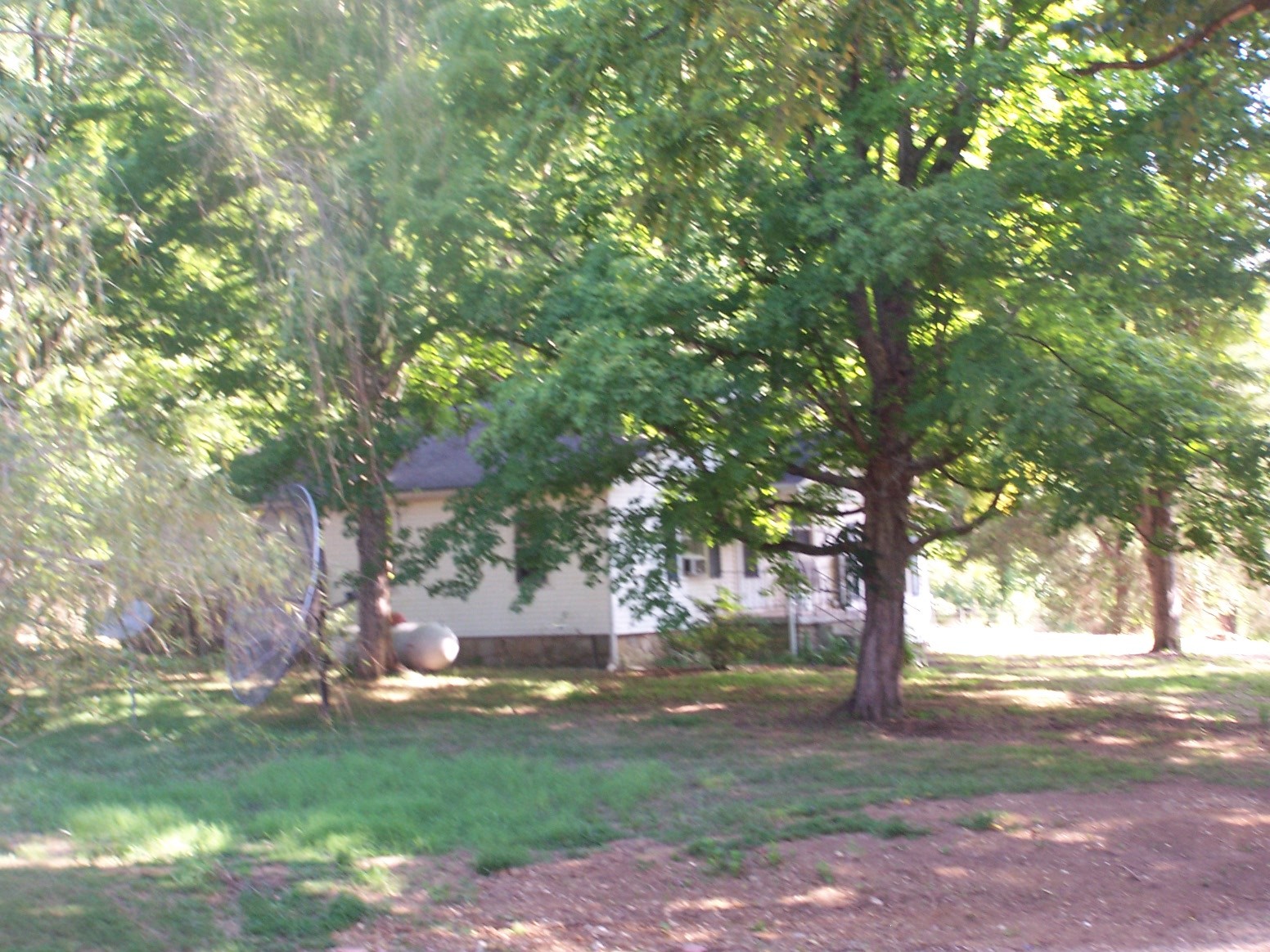 1346 Garner Hollow Road Pulaski, TN 38478 - Photo 9 of 42 a backyard of a house with lots of green space