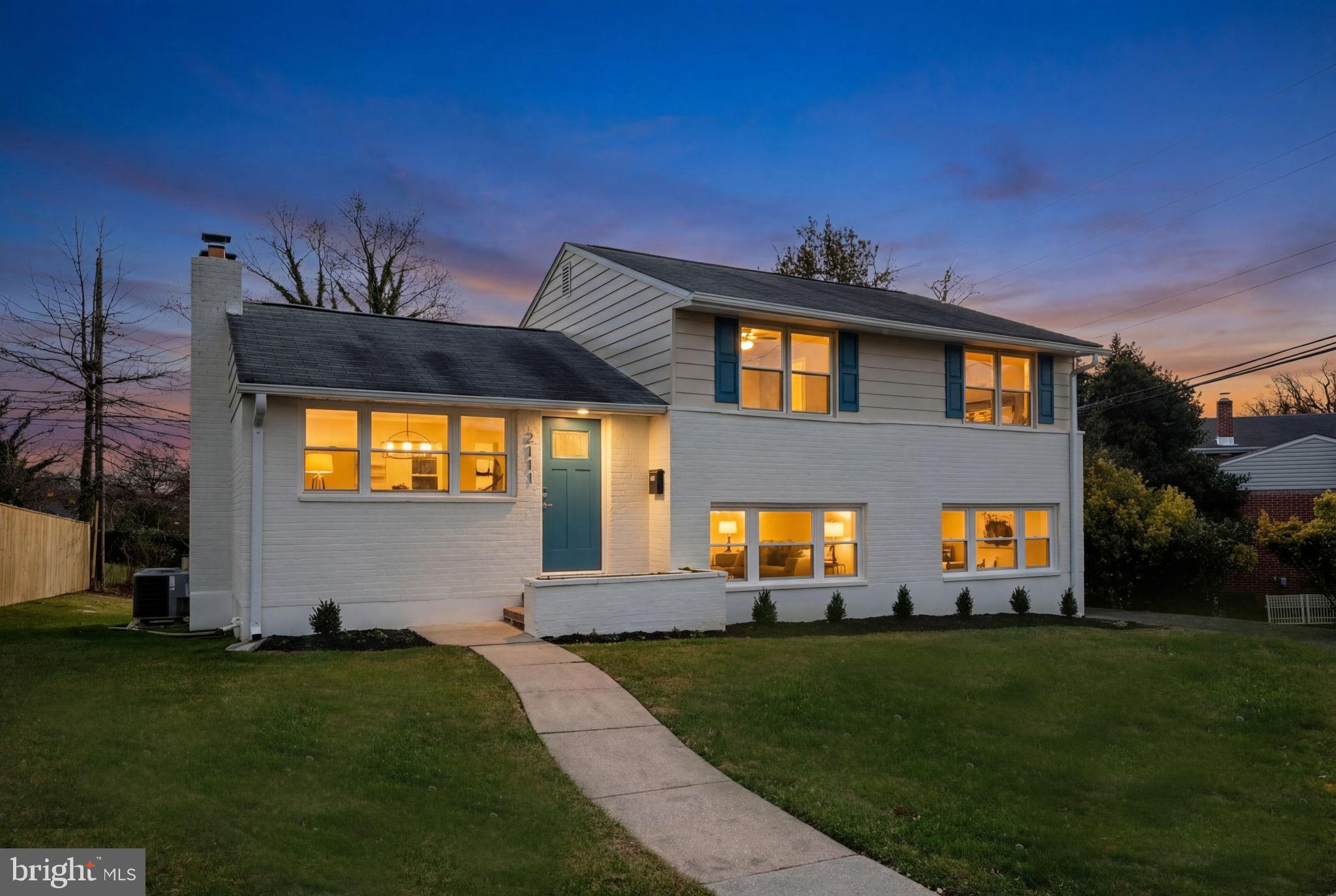 2111 Eastridge Road Lutherville-Timonium, MD 21093 - Photo 1 of 44 a front view of a house with a garden