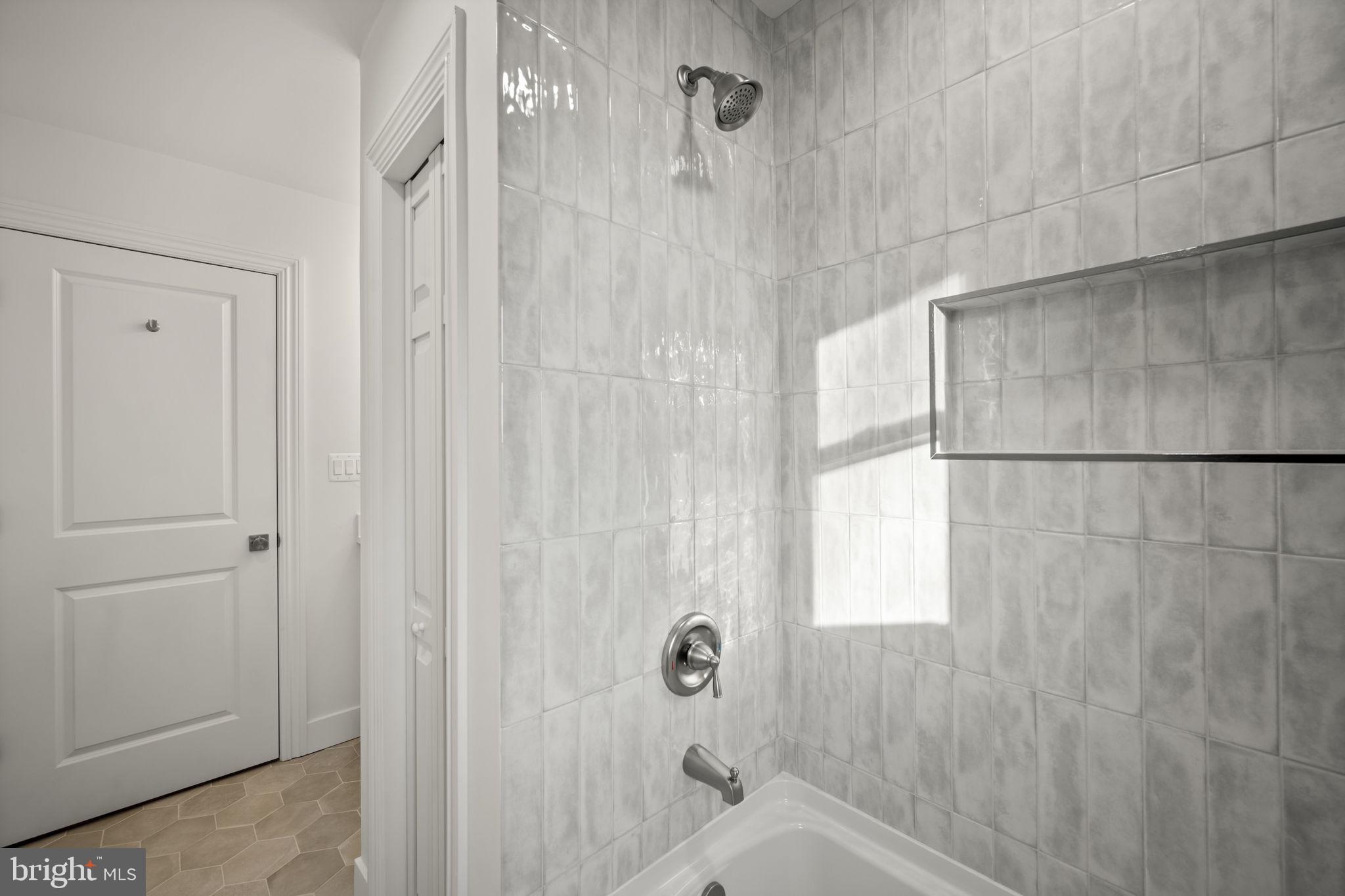 2111 Eastridge Road Lutherville-Timonium, MD 21093 - Photo 15 of 44 a bathroom with a shower