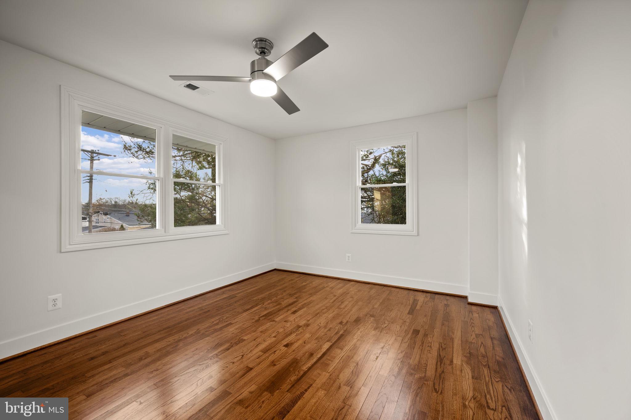 2111 Eastridge Road Lutherville-Timonium, MD 21093 - Photo 18 of 44 a view of empty room with wooden floor and fan