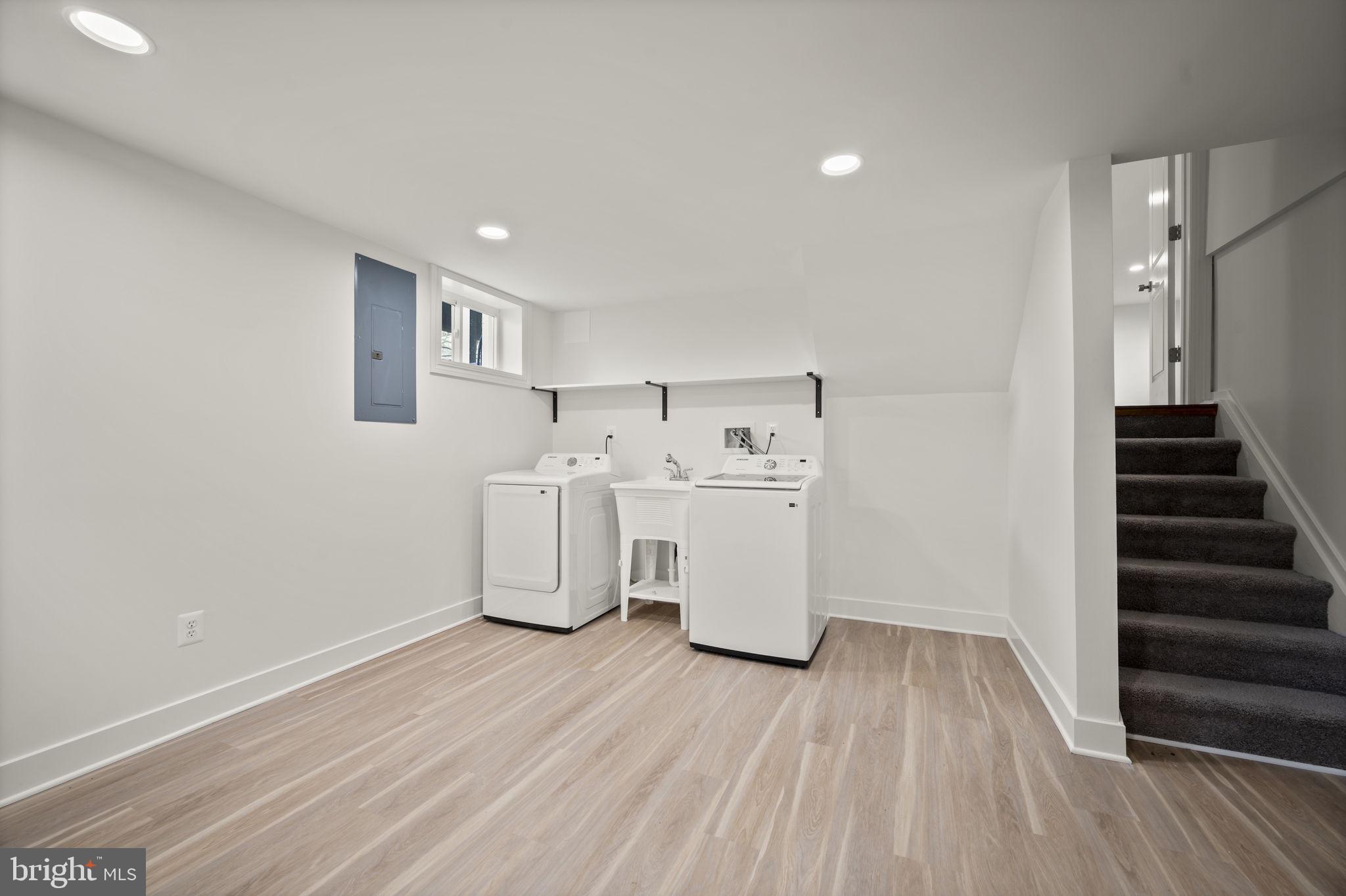 2111 Eastridge Road Lutherville-Timonium, MD 21093 - Photo 26 of 44 a view of a room with wooden floor and stairs