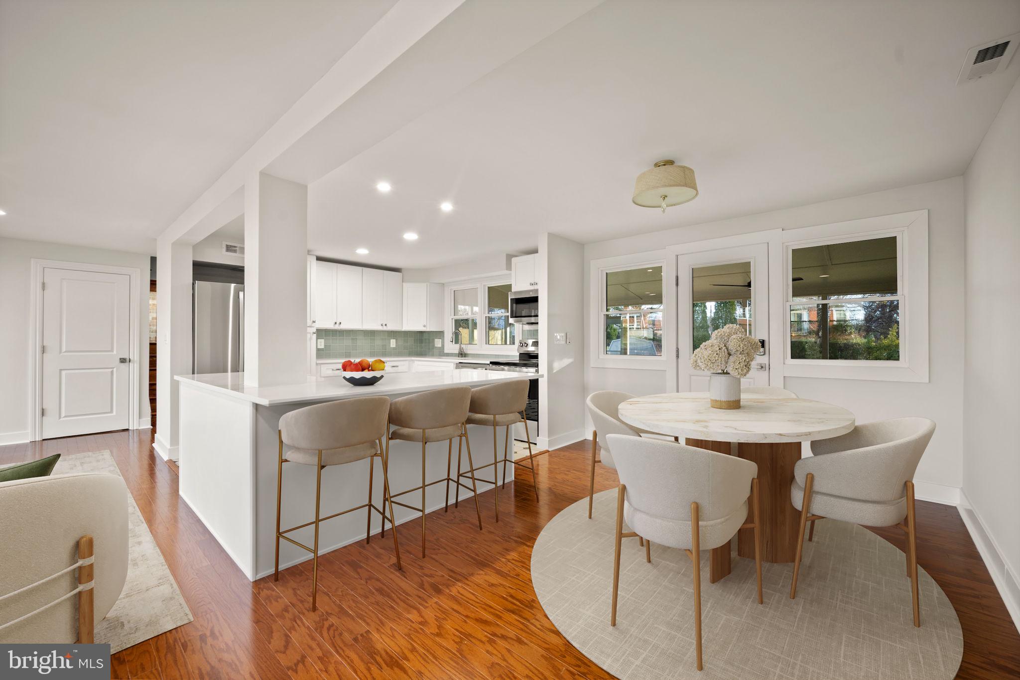 2111 Eastridge Road Lutherville-Timonium, MD 21093 - Photo 9 of 44 a view of a dining room with furniture