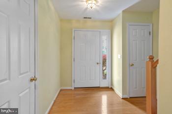 312 Blenny Lane Chester, MD 21619 - Photo 27 of 44 a view of a hallway with a dining room