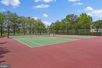 312 Blenny Lane Chester, MD 21619 - Photo 43 of 44 a view of a tennis court