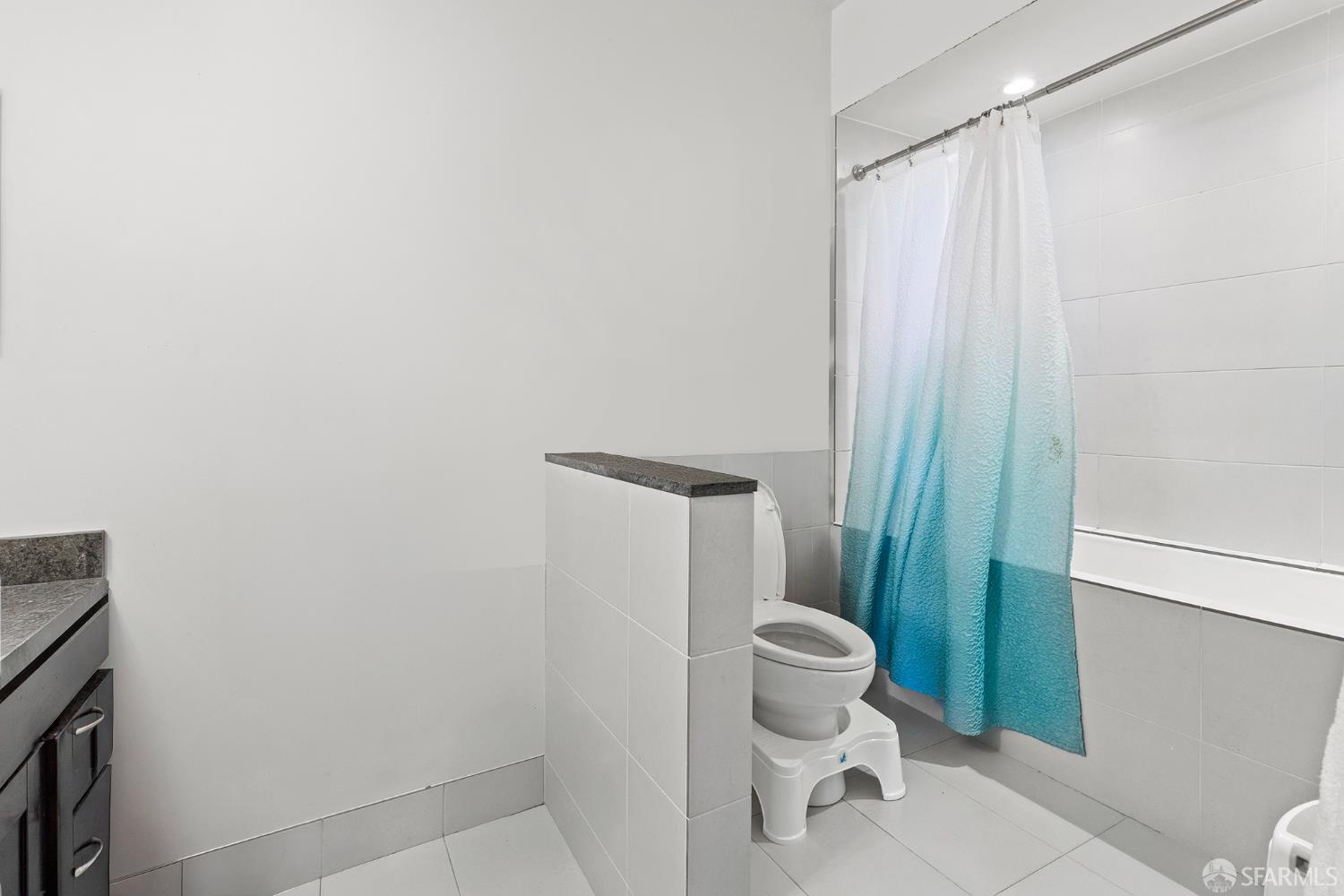 2040 Broadway, Unit 102 San Francisco, CA 94115 - Photo 10 of 16 a bathroom with a toilet and a shower