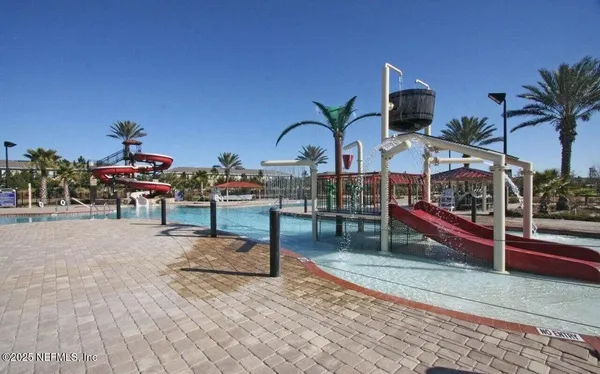a outdoor space with lots of potted plants