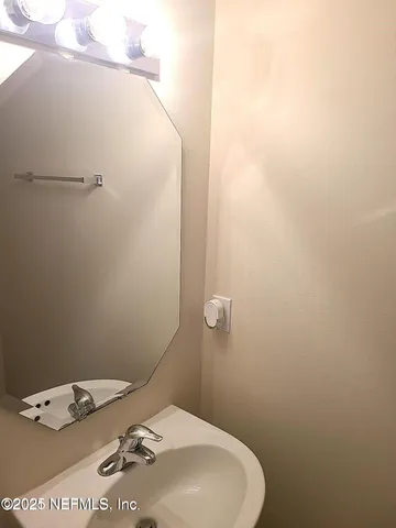 a bathroom with a sink and toilet