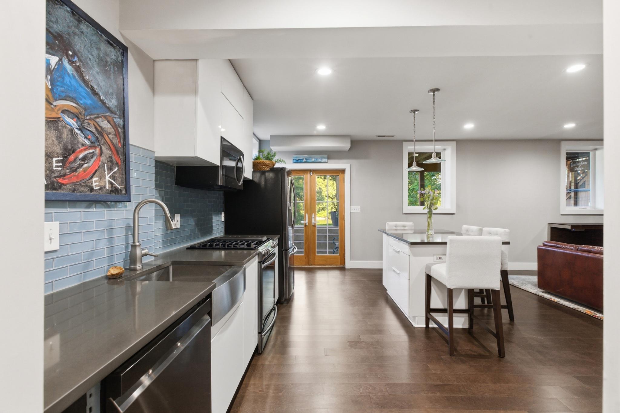 1219 Meadow View Road Pasadena, MD 21122 - Photo 46 of 70 Lower level modern kitchen with vibrant accents.