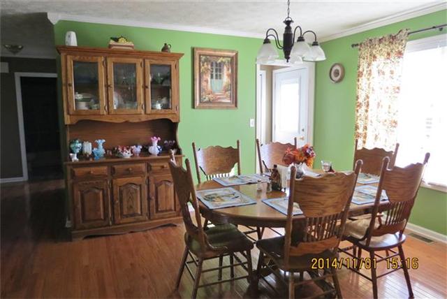 475 Hurricane Loop Tennessee Ridge, TN 37178 - Photo 9 of 20 Dining room with hardwood flooring
