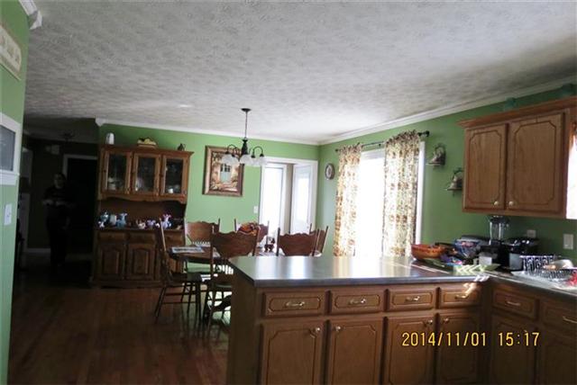 475 Hurricane Loop Tennessee Ridge, TN 37178 - Photo 10 of 20 View from kitchen to dining area