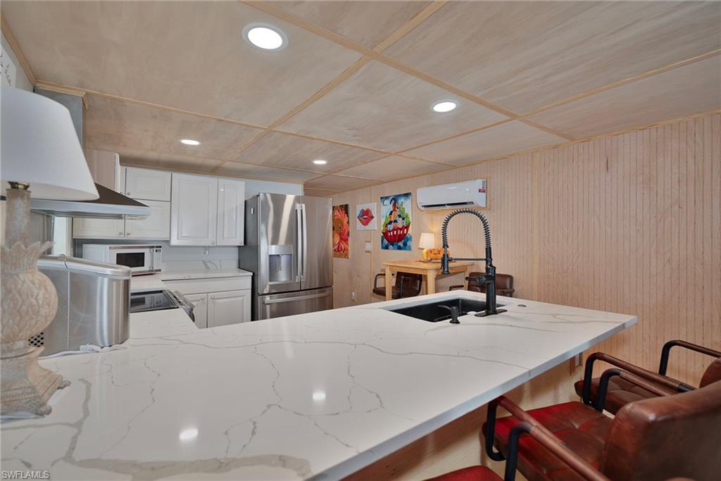 777 Walkerbilt Road, Unit 34 Naples, FL 34110 - Photo 7 of 23 Kitchen