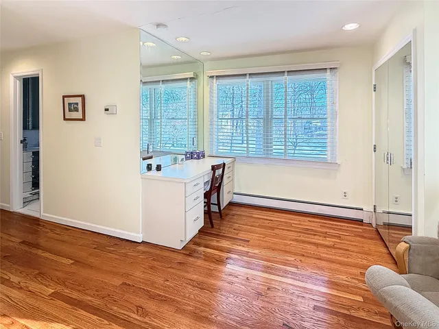 a view of a livingroom with furniture and staircase