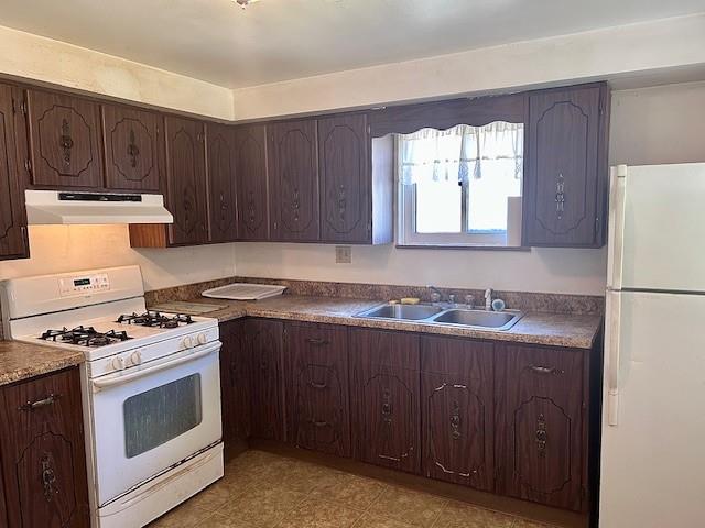 624 George Street Turtle Creek, PA 15145 - Photo 5 of 17 a kitchen with granite countertop wooden cabinets stove top oven and sink