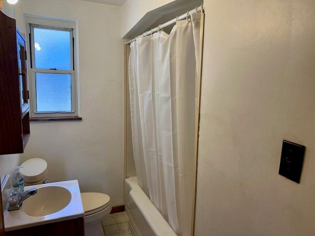 624 George Street Turtle Creek, PA 15145 - Photo 6 of 17 a bathroom with a toilet sink a mirror and shower curtain