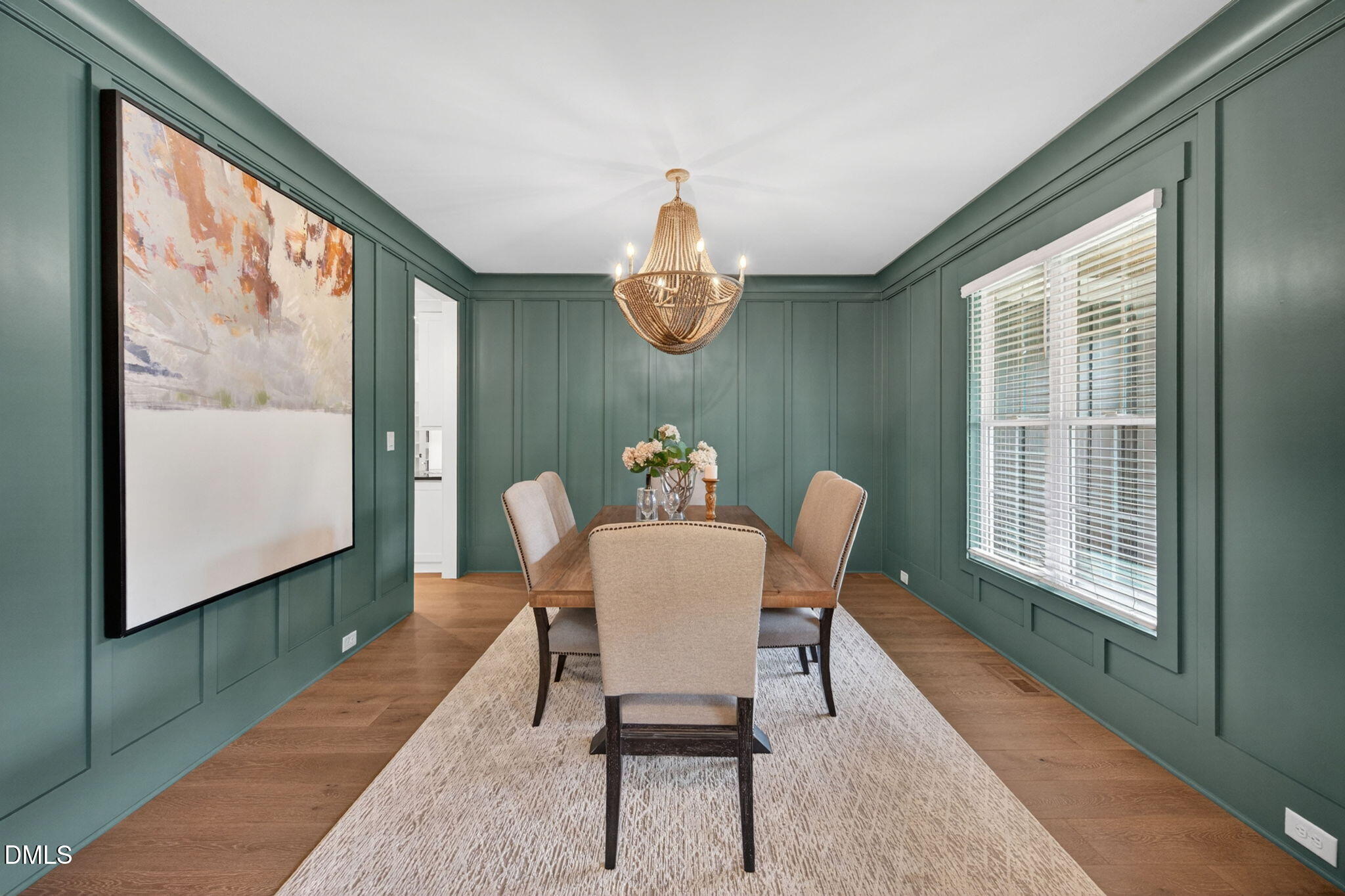 3417 Edgemont Drive Raleigh, NC 27612 - Photo 4 of 83 a dining room with furniture a window and wooden floor