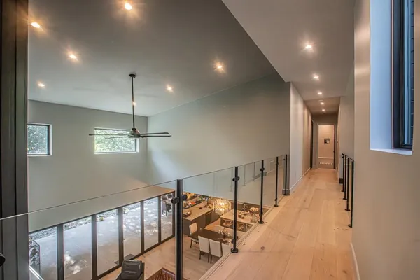 a view of a hallway with a chandelier
