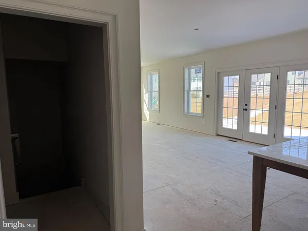 a room with cabinets and window