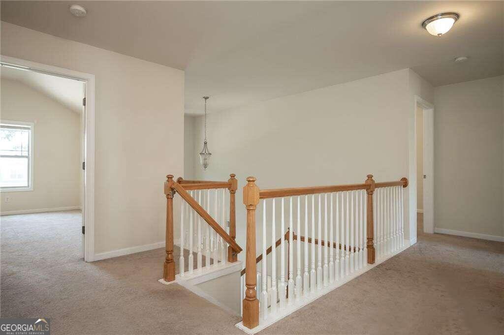 304 Ridge Pointe Drive Athens, GA 30606 - Photo 21 of 50 a view of a hallway with windows
