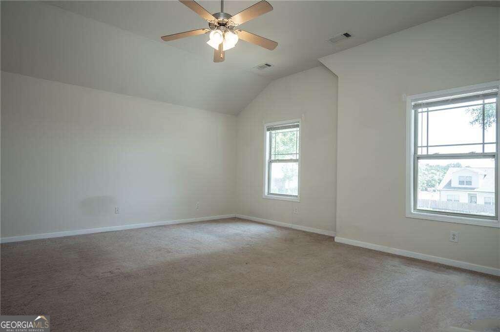 304 Ridge Pointe Drive Athens, GA 30606 - Photo 22 of 50 a view of an empty room with a window