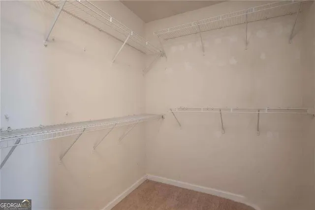 a view of a room with racks on the wall