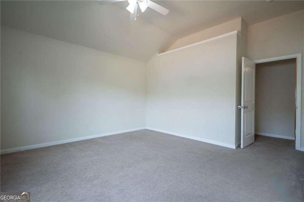304 Ridge Pointe Drive Athens, GA 30606 - Photo 36 of 50 an empty room with a chandelier fan