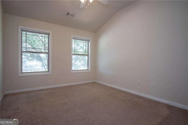 an empty room with windows