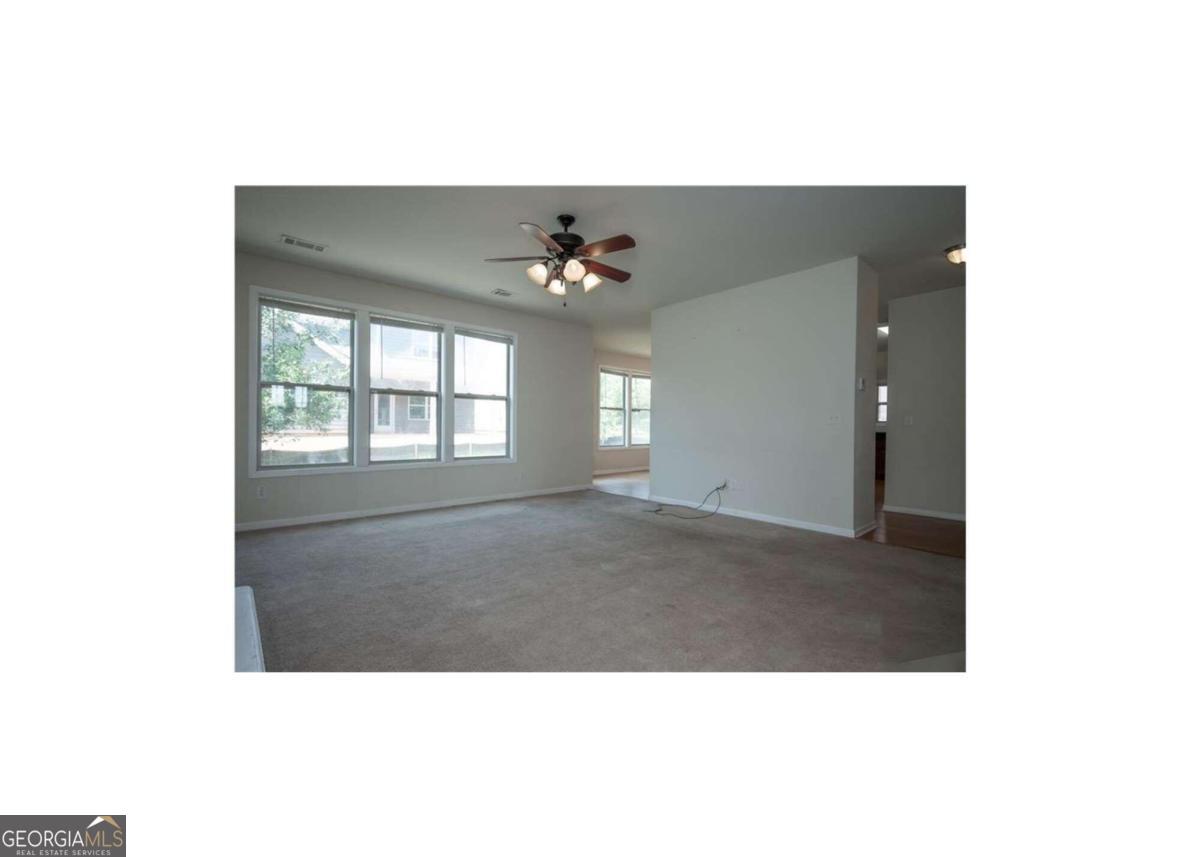 304 Ridge Pointe Drive Athens, GA 30606 - Photo 6 of 50 a view of an empty room with a window