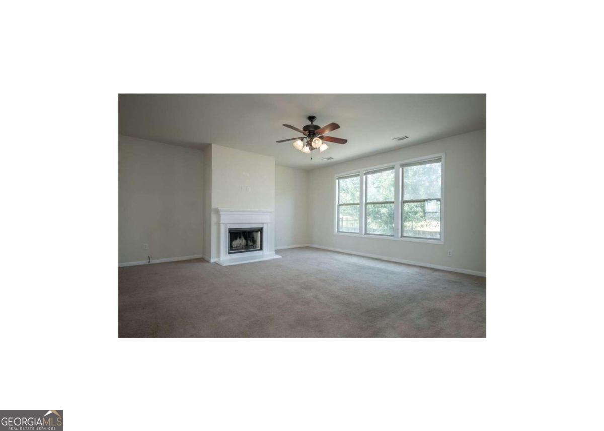 304 Ridge Pointe Drive Athens, GA 30606 - Photo 9 of 50 a view of an empty room with a window