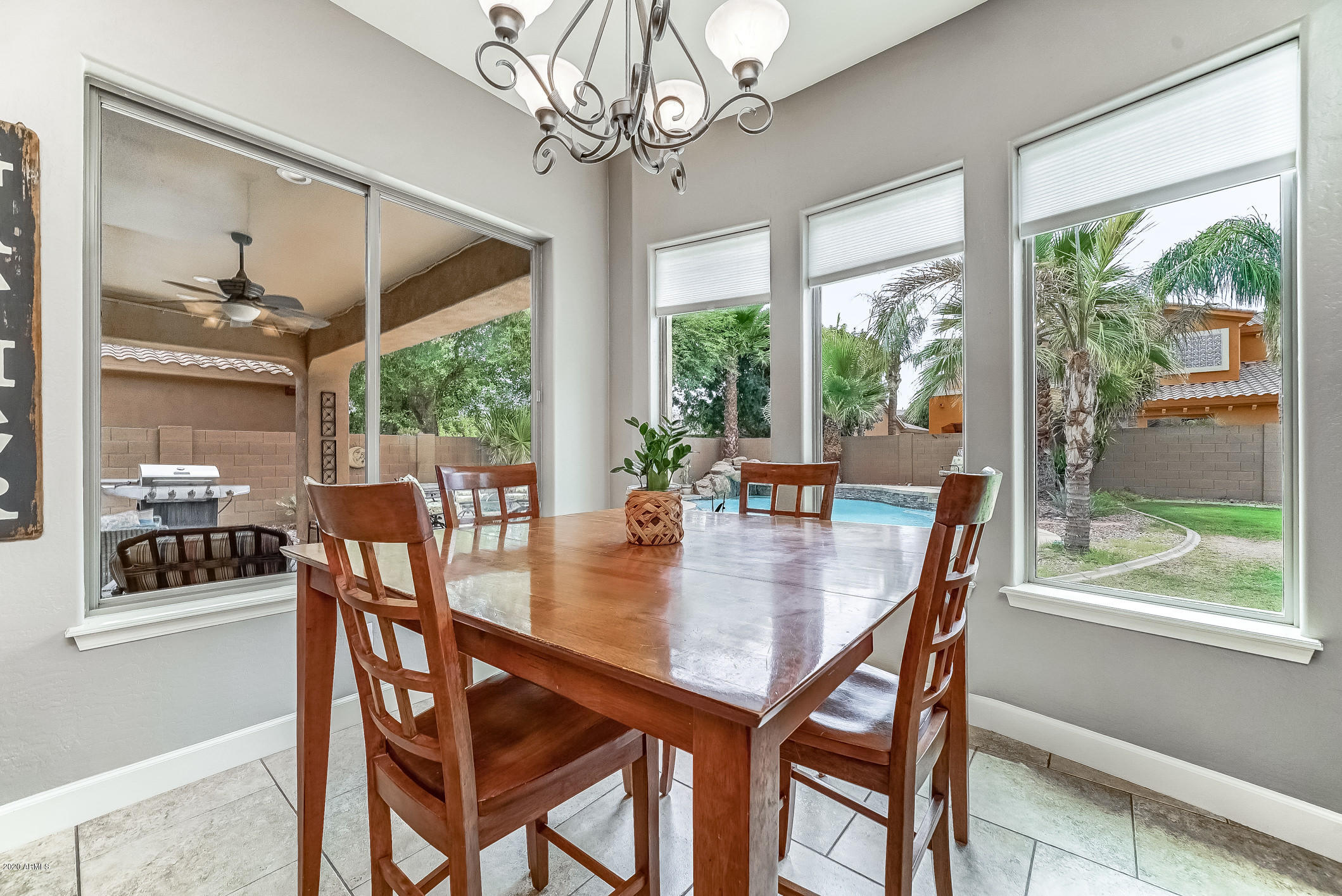 4259 East Los Altos Road Gilbert, AZ 85297 - Photo 32 of 79 a view of a dining room with furniture window and outside view
