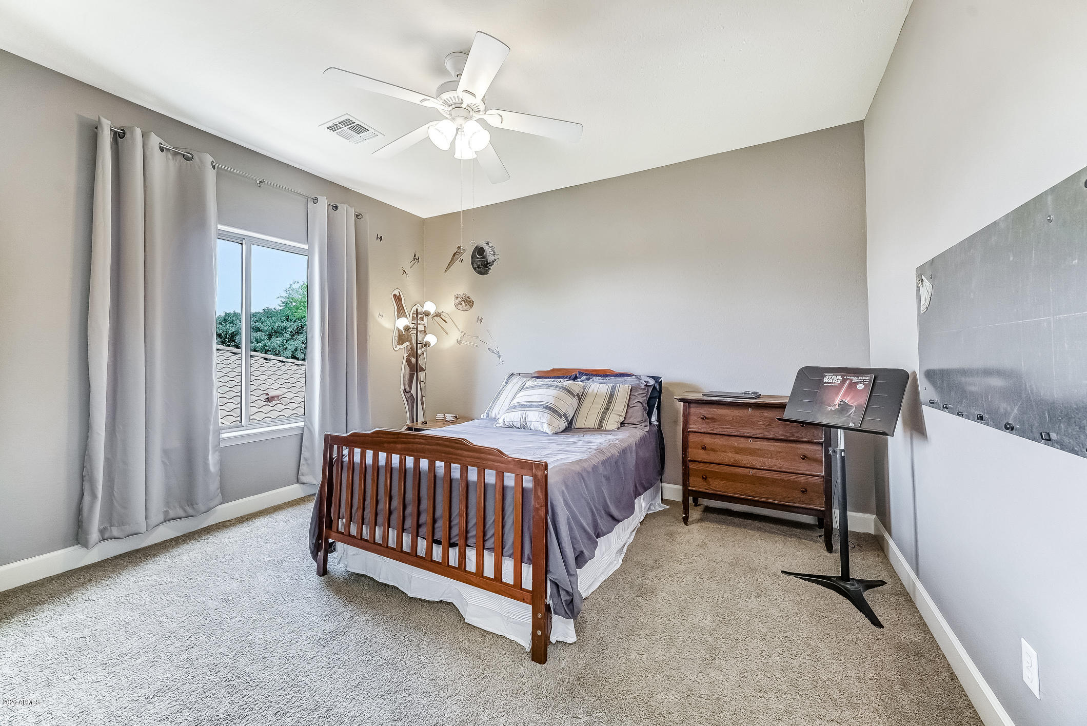 4259 East Los Altos Road Gilbert, AZ 85297 - Photo 38 of 79 a bed room with a bed chair and a window