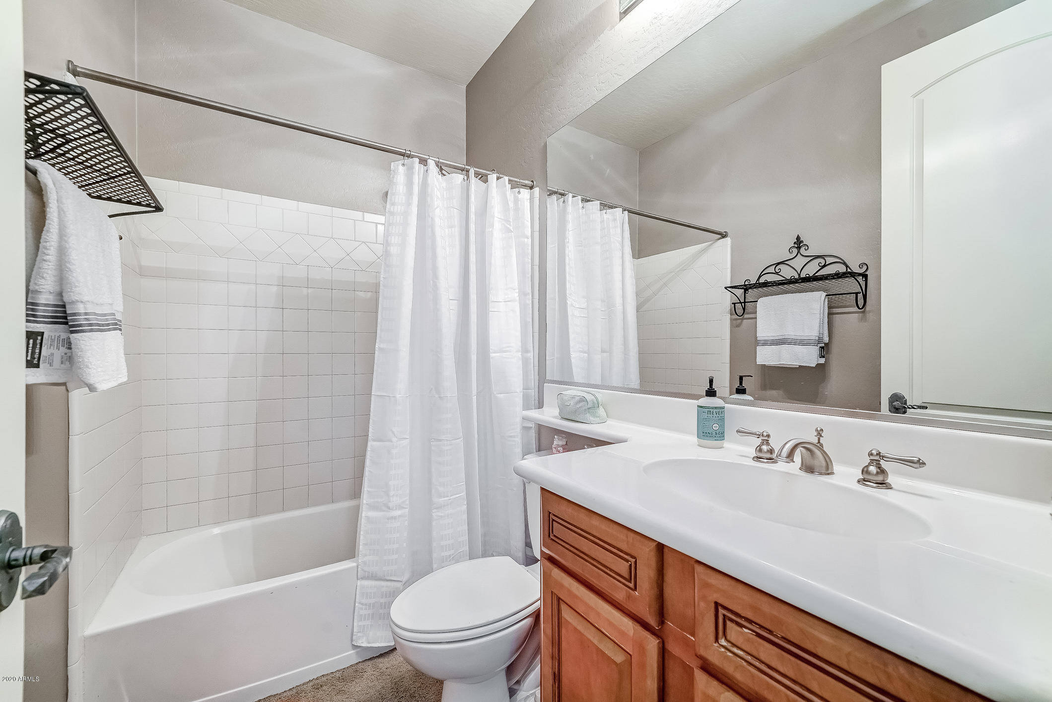 4259 East Los Altos Road Gilbert, AZ 85297 - Photo 54 of 79 a bathroom with a sink a toilet and shower