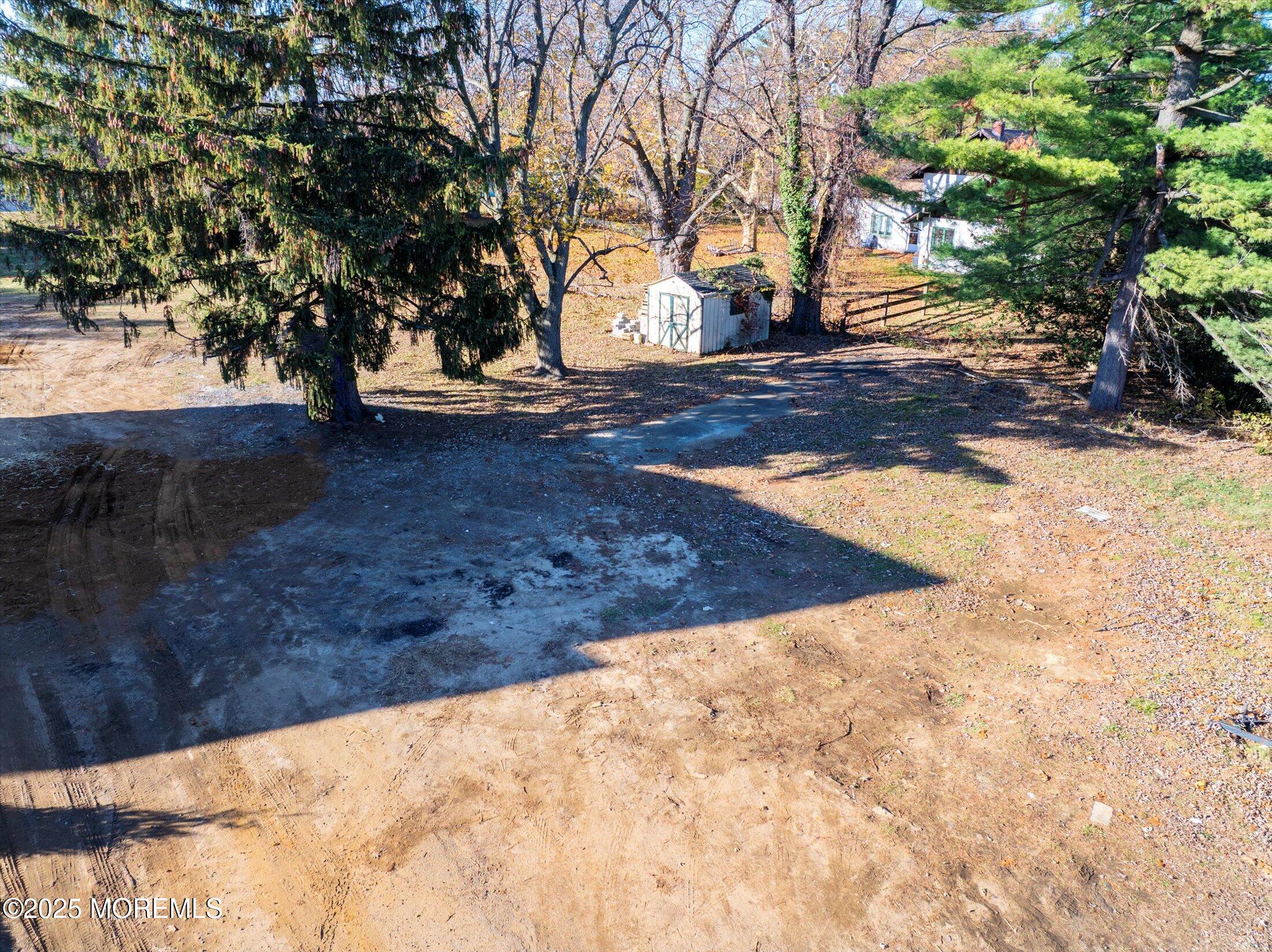 748 Holmdel Road Holmdel, NJ 07733 - Photo 7 of 14 a view of yard with tree s