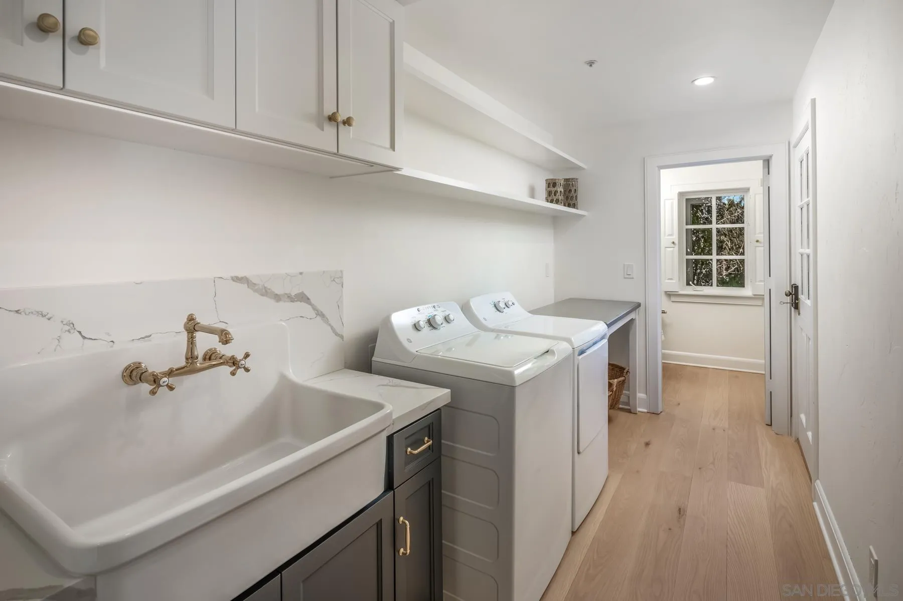 6502 Via Vista Canada Rancho Santa Fe, CA 92067 - Photo 20 of 55 a utility room with sink dryer and washer