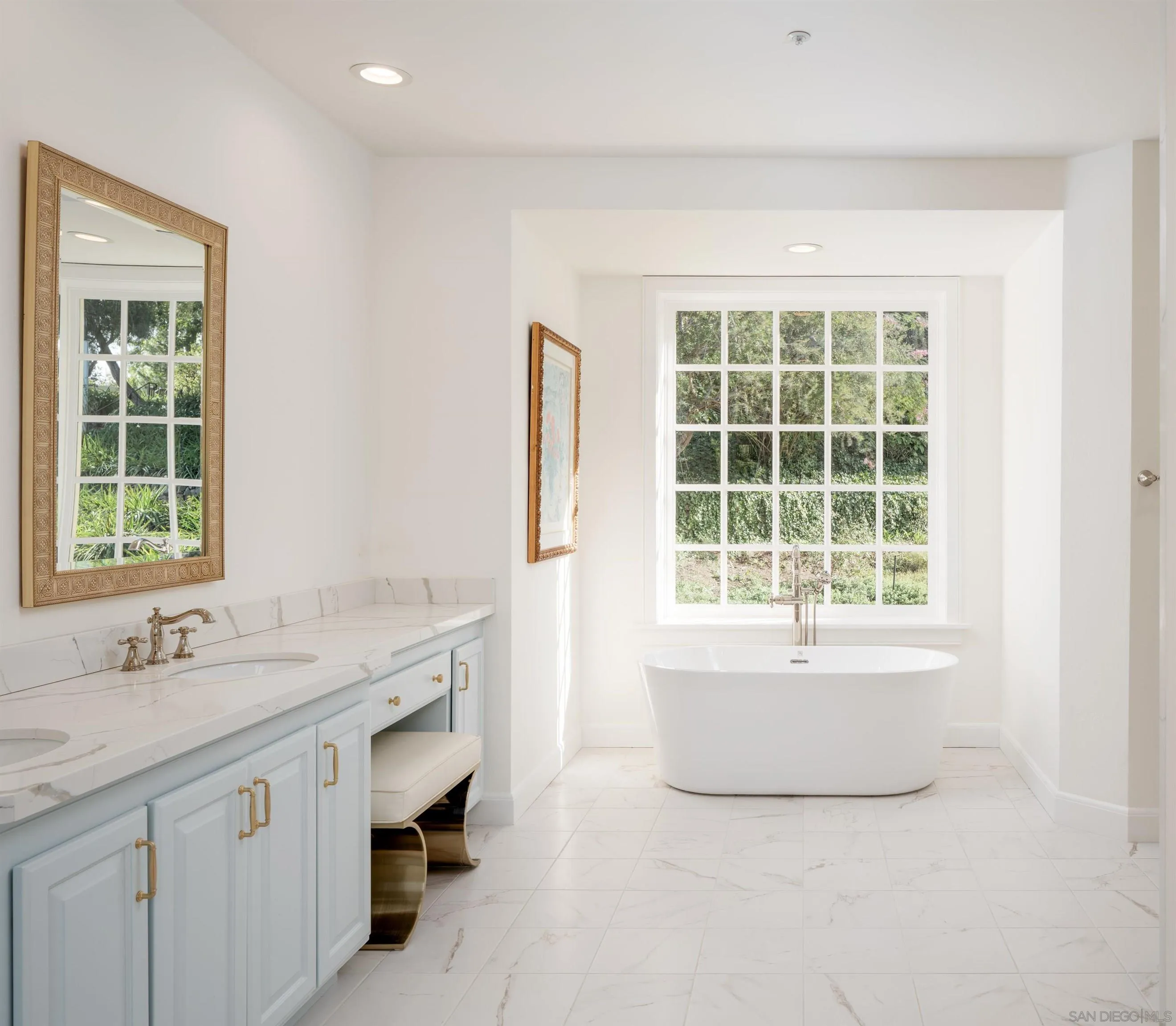 6502 Via Vista Canada Rancho Santa Fe, CA 92067 - Photo 31 of 55 a bathroom with a granite countertop sink and a bathtub with four windows