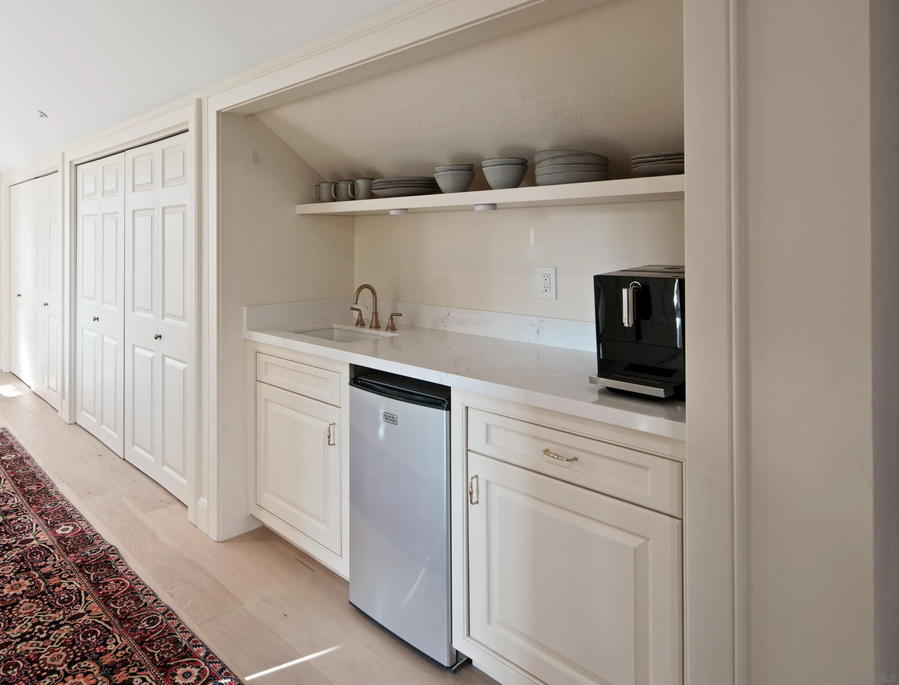6502 Via Vista Canada Rancho Santa Fe, CA 92067 - Photo 40 of 55 a kitchen with white cabinets and sink