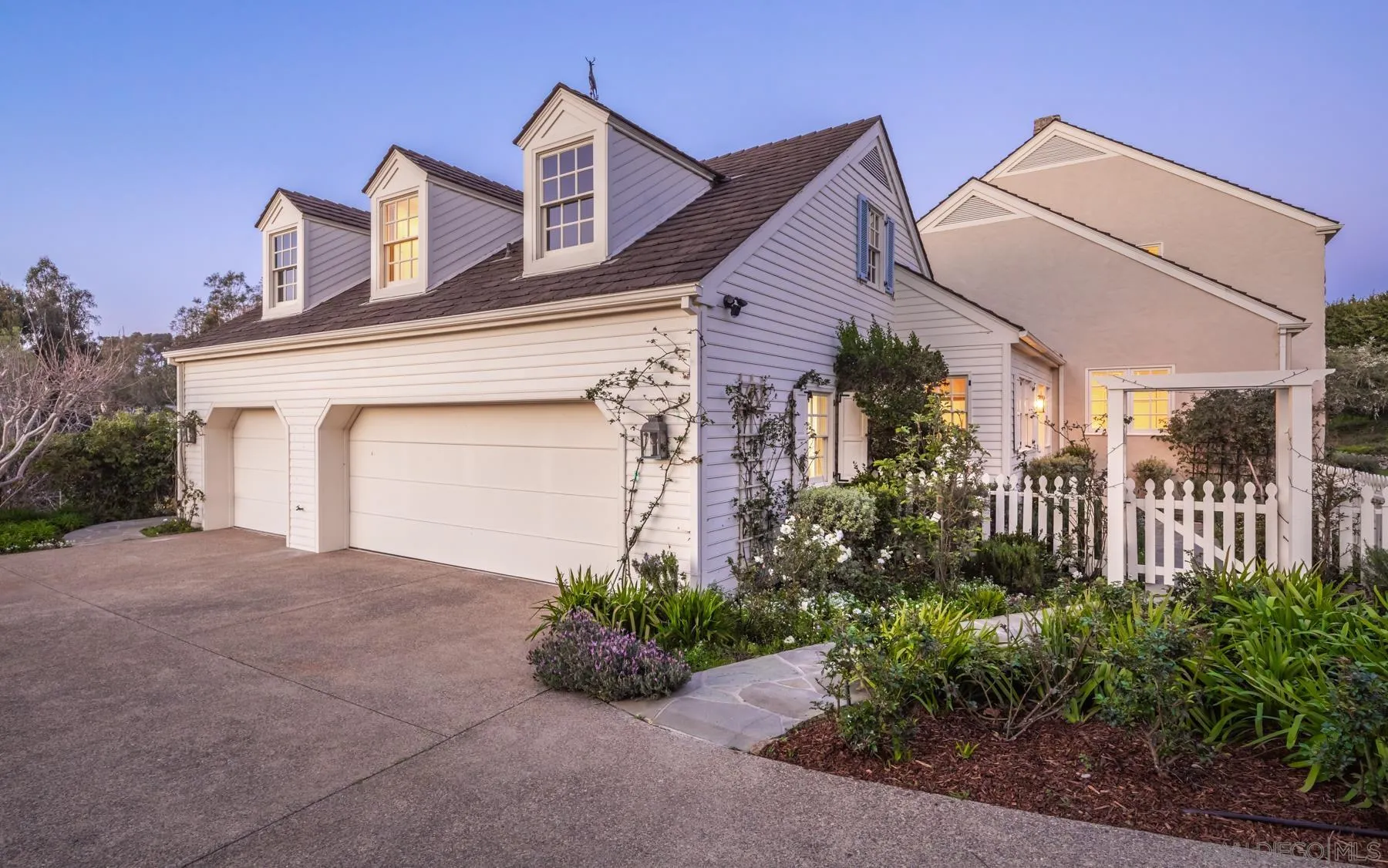 6502 Via Vista Canada Rancho Santa Fe, CA 92067 - Photo 4 of 55 a view of a house with a small yard and plants