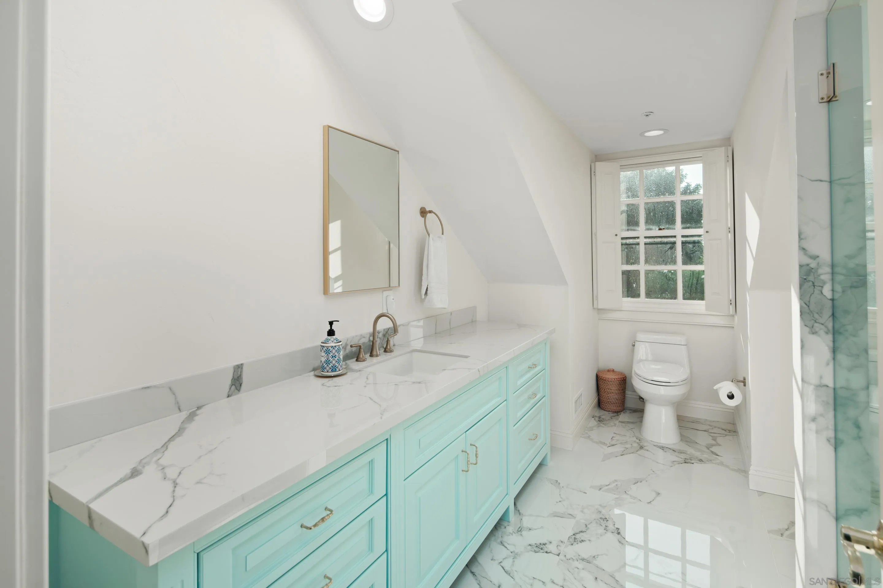 6502 Via Vista Canada Rancho Santa Fe, CA 92067 - Photo 43 of 55 a bathroom with a granite countertop sink mirror and a toilet