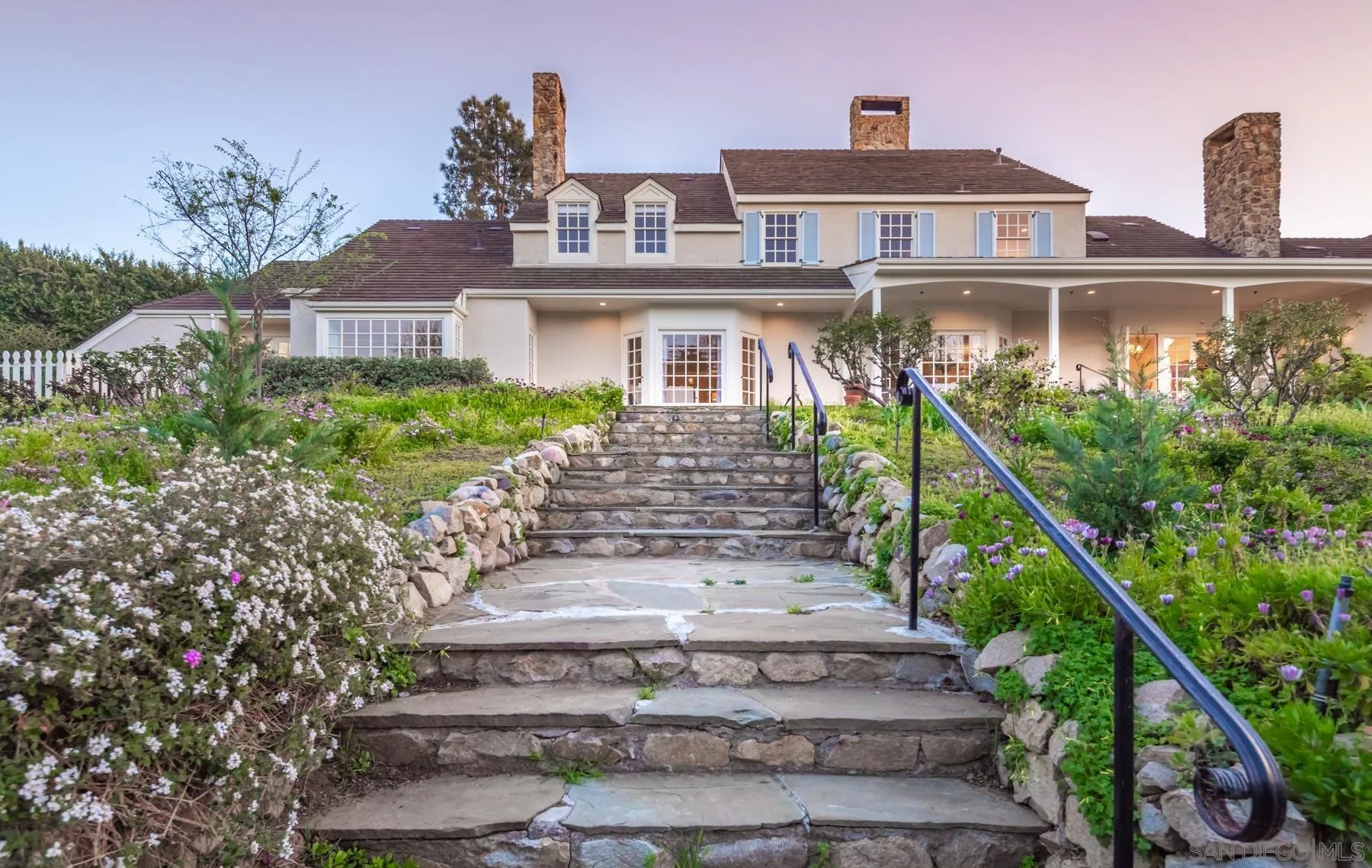 6502 Via Vista Canada Rancho Santa Fe, CA 92067 - Photo 45 of 55 a front view of a house with a yard