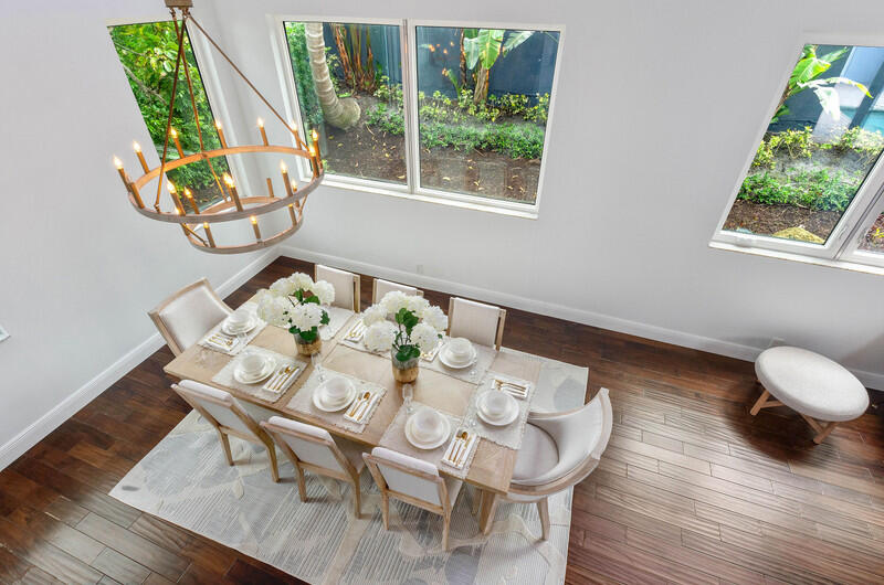 1710 Southwest 2nd Avenue Boca Raton, FL 33432 - Photo 12 of 29 a view of a dining room with furniture and a large window