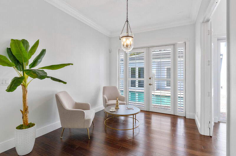 1710 Southwest 2nd Avenue Boca Raton, FL 33432 - Photo 16 of 29 a view of a dining room with furniture window and wooden floor