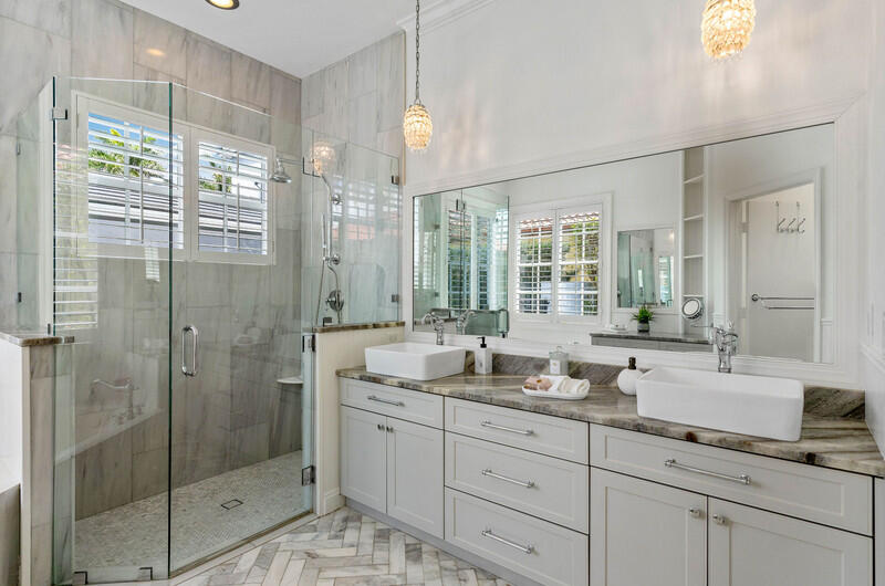 1710 Southwest 2nd Avenue Boca Raton, FL 33432 - Photo 18 of 29 a bathroom with double vanity and a shower