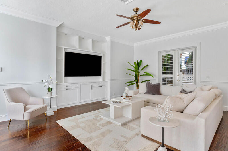 1710 Southwest 2nd Avenue Boca Raton, FL 33432 - Photo 4 of 29 a living room with furniture and a flat screen tv