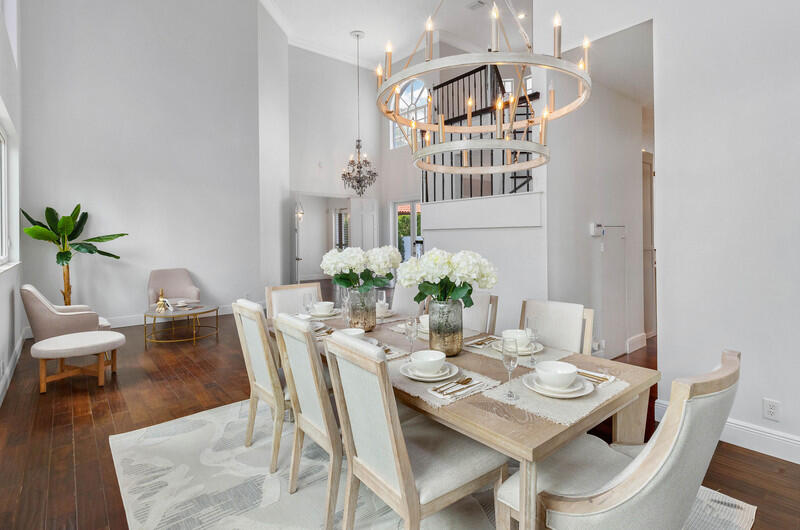 1710 Southwest 2nd Avenue Boca Raton, FL 33432 - Photo 9 of 29 a view of a dining room with furniture and wooden floor
