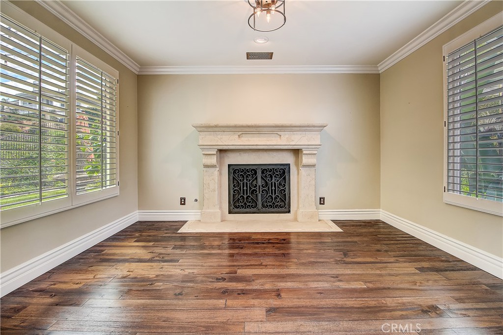 14182 Crystal View Terrace Riverside, CA 92508 - Photo 34 of 74 a view of an empty room with window and wooden floor