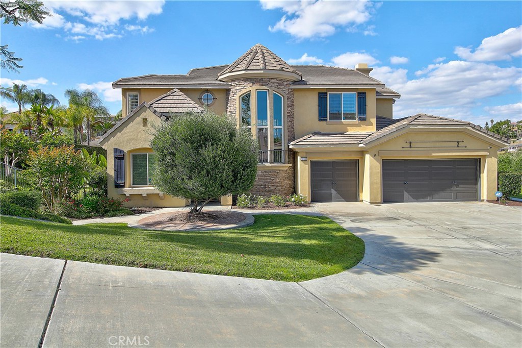 14182 Crystal View Terrace Riverside, CA 92508 - Photo 5 of 74 front view of a house with a yard