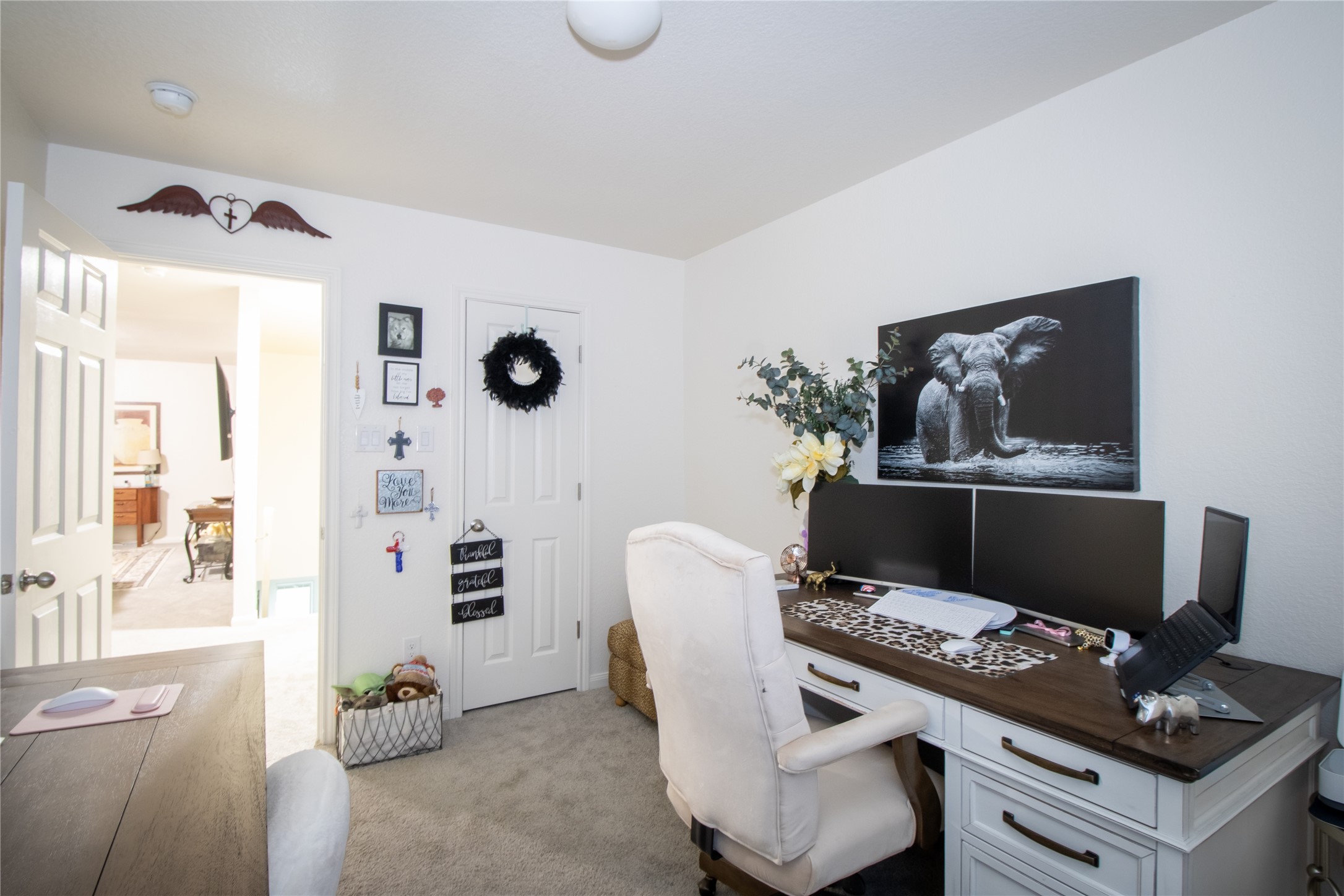 15583 Arrowhead Loop West Willis, TX 77378 - Photo 11 of 21 a living room with furniture and wall paintings