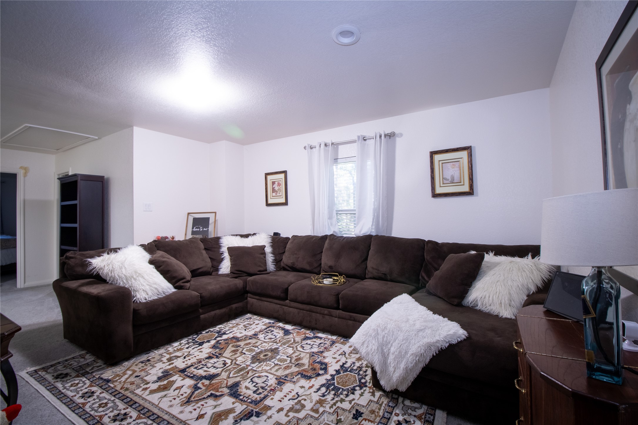 15583 Arrowhead Loop West Willis, TX 77378 - Photo 19 of 21 a living room with furniture and a couch