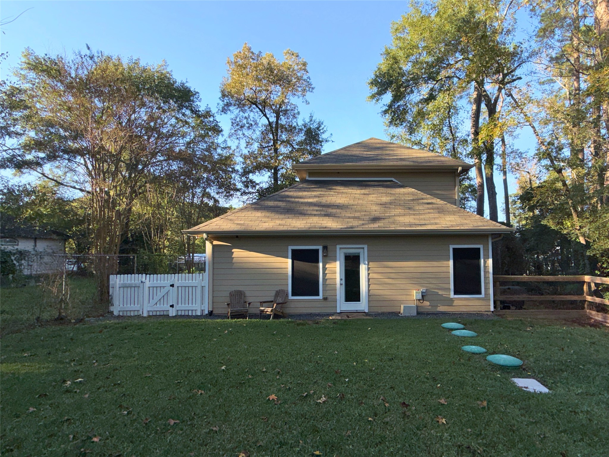 15583 Arrowhead Loop West Willis, TX 77378 - Photo 21 of 21 a view of a house with a yard